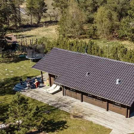 Authentic Log House Amid Evergreens In Vendsyssel *